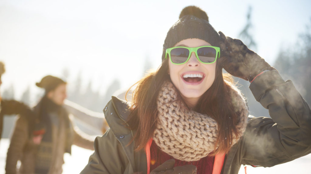 Cheerful woman in warm clothes